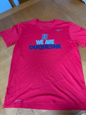 Nike Dri-FIT "We Are Duquesne" red Athletic Tee